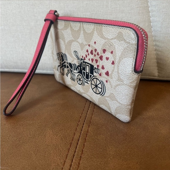 COACH Corner Zip Wristlet In Signature Canvas With Horse & Carriage Hearts Motif - Picture 9 of 15